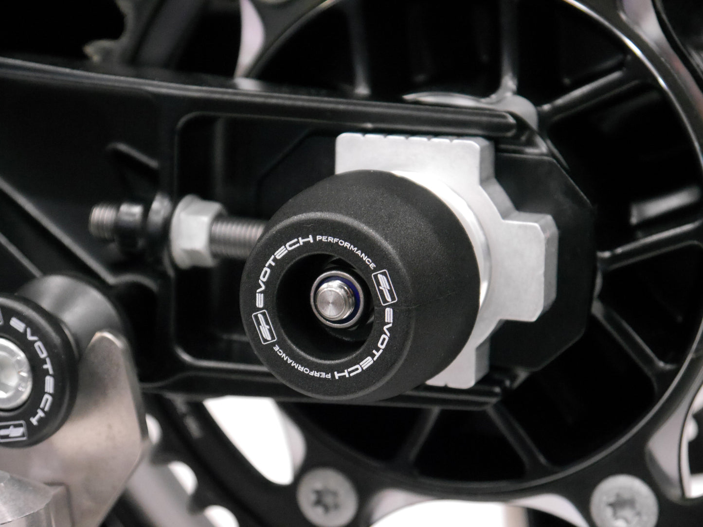 EP crash protection slider from EP Rear Spindle Bobbins attached onto the swingarm of the KTM 790 Adventure.