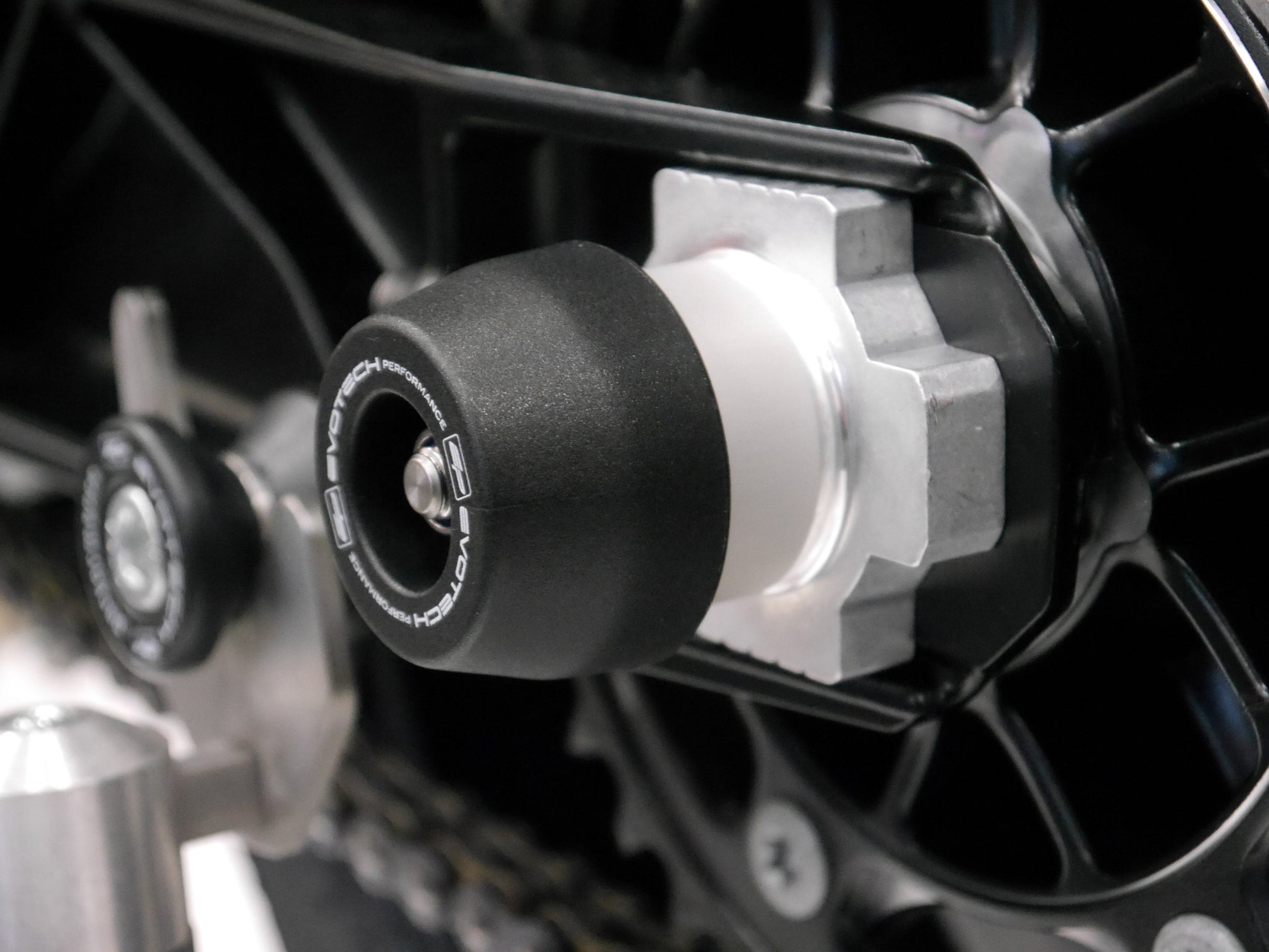 EP’s Rear Spindle Bobbin’s nylon and aluminium crash protection bung extending from the swingarm of the KTM 790 Adventure. 